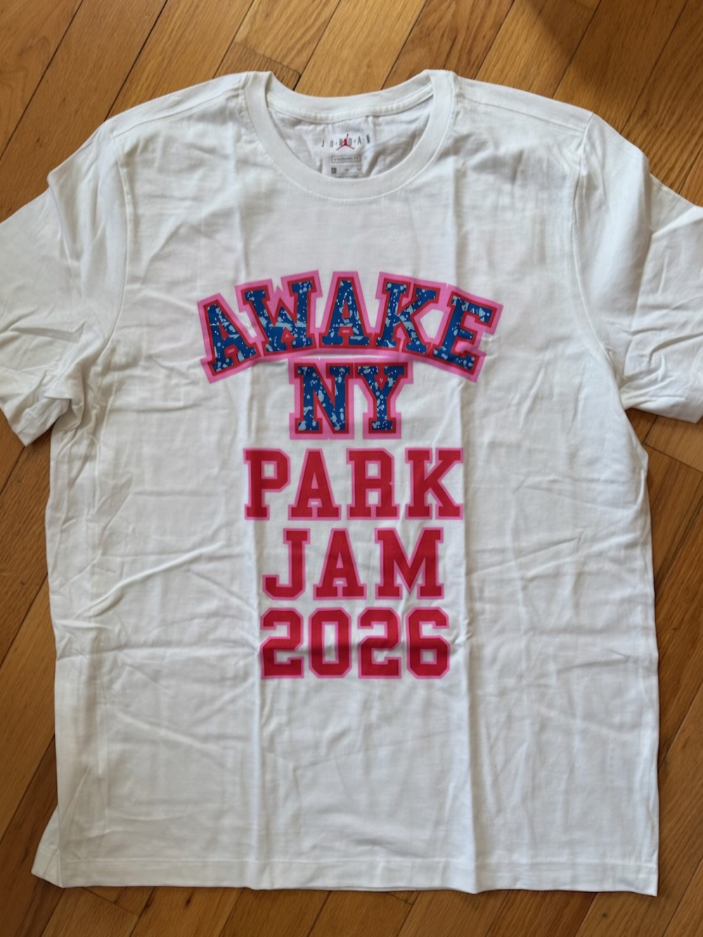 Jordan White Kids Graphic Tee with Pink & Blue Lettering